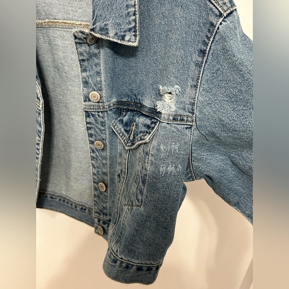 Distressed jean jacket. Cropped length - Picture 3 of 8